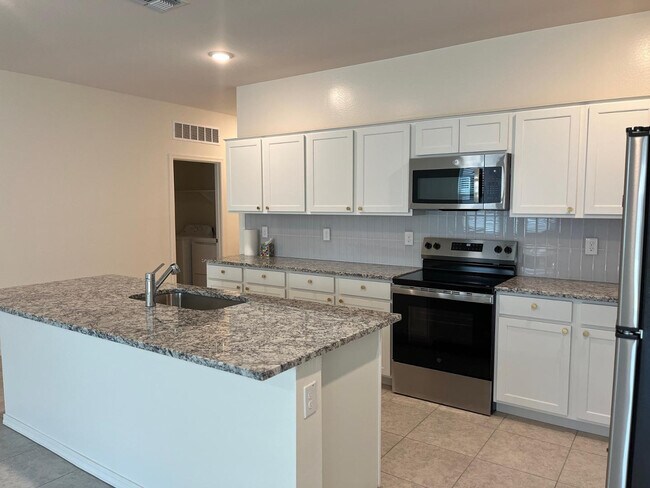 Building Photo - 4466 N 100th Dr