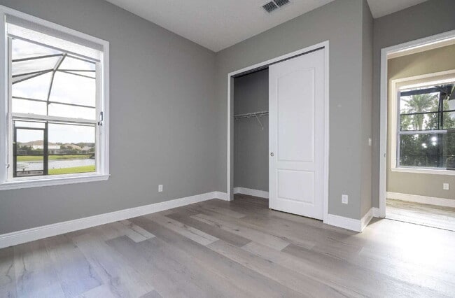 Building Photo - Spacious 4-Bed, 4-Bath Haven in Winter Garden – 3,388 Sq. Ft. of Comfort on Green Mountain Way