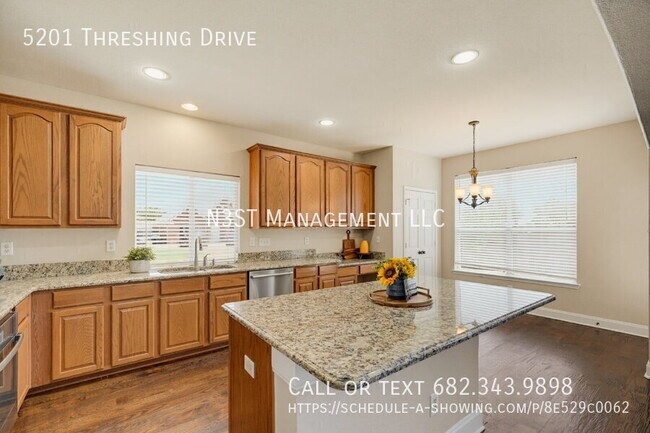 Building Photo - 5201 Threshing Dr