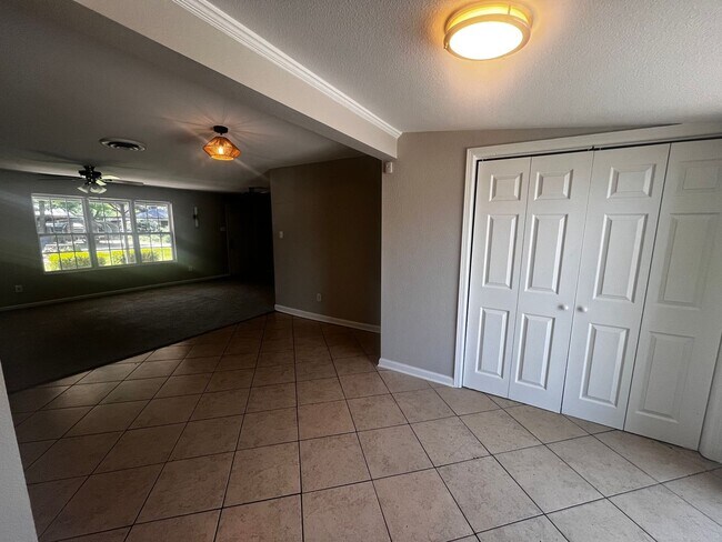 Building Photo - Freshly updated home with privacy fence in...