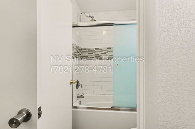 Building Photo - NW!! 4 Bedrooms!!! All Tile and Pergo flooring T/O!! NO Carpet!!! Low Maintenance Desert landscap...