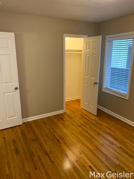 Second bedroom with lit closet. - 404 12th Ave N