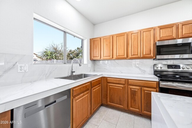 Building Photo - 9054 W Custer Ln