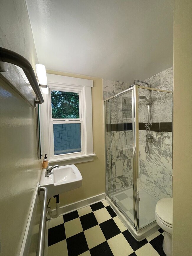 Building Photo - Elegant 4BR 2.5Bath Home with Fenced Yard & Garage Across from Seattle Prep**one month FREE rent**