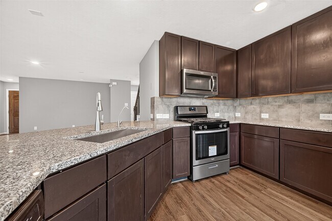 Building Photo - 8932 Hollister Commons Ln