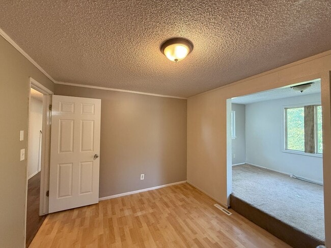Building Photo - Cozy 4BR Home with Extra Space & Outdoor C...