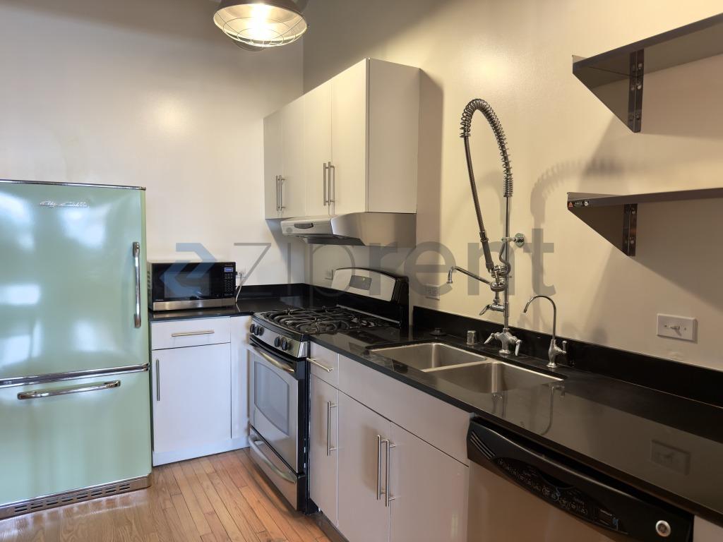 Building Photo - Unit 208