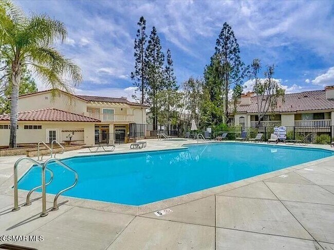 Building Photo - Welcome to this beautifully situated first-floor end unit