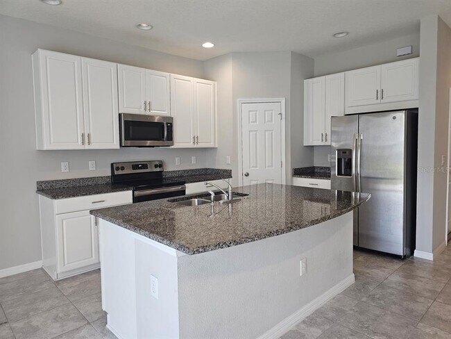 Building Photo - 7113 Grand Elm Dr