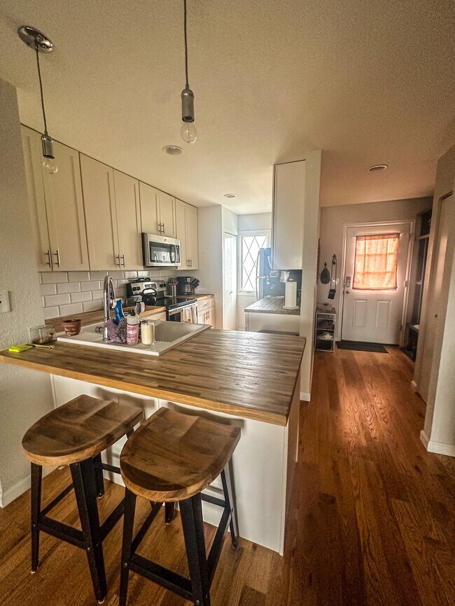 Butcher block counters, pantry and lots of kitchen storage - 9429 W Ontario Dr