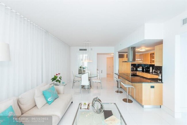 Building Photo - 6899 Collins Ave