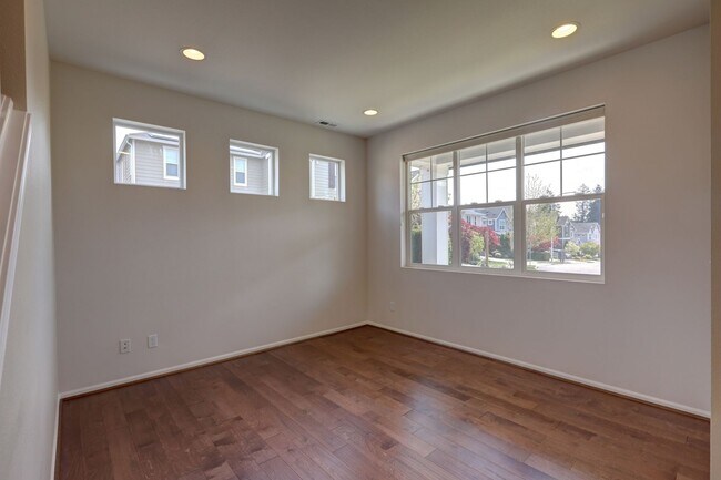 Building Photo - 4 Bedroom Home with Open Den, Living & Family Rooms – Space for Everyone