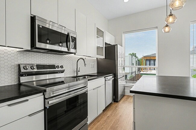 Building Photo - Be the first to live in Unit 207 at 2217 Fitzhugh—a brand-new 2026 construction offering 601 sq f...