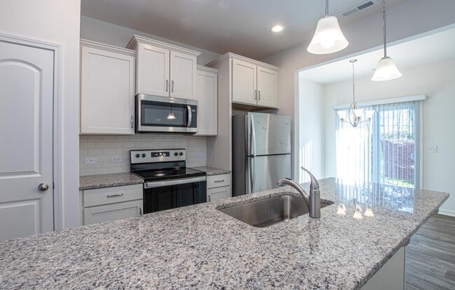 Building Photo - BEAUTIFUL 2 Bedroom End Unit Townhome in Cox Mill District AVAILABLE NOW