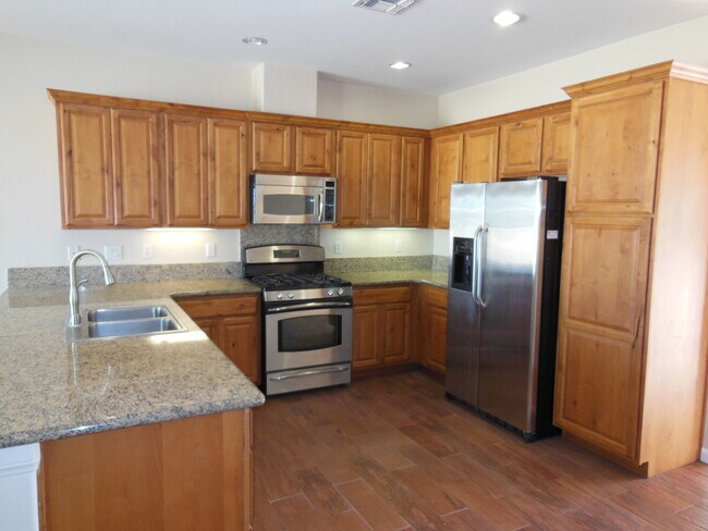 Building Photo - Swamp Cooler, Central AC and Tile Throughout!
