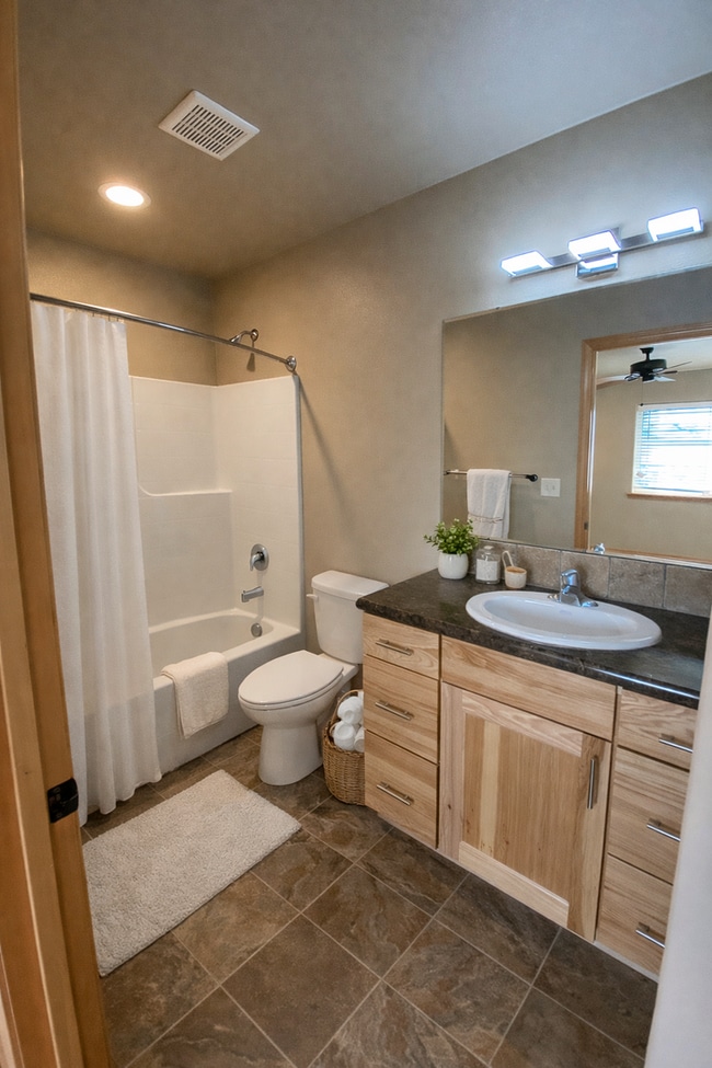 Building Photo - Beautiful Open-Concept Townhome with Washer & Dryer, Carport & $$$$ Move-In Credit