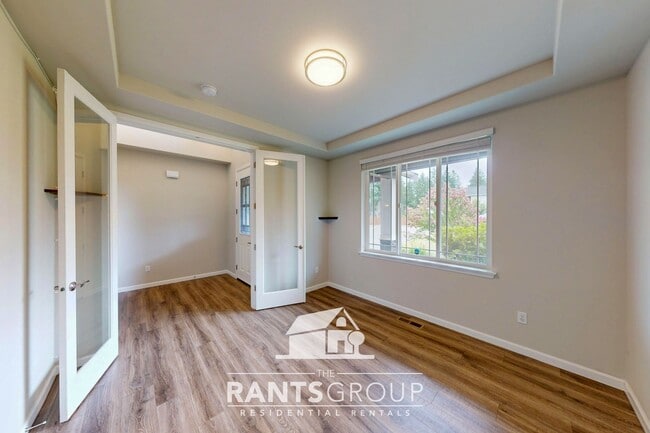 Building Photo - Luxury 4-Bedroom Home with 5-Car Garage & ...