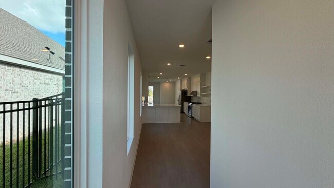 Building Photo - 27451 Sunterra Village Dr