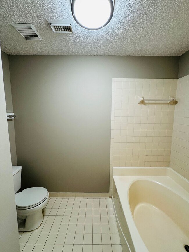 Building Photo - Your new home is just a putt away with thi...