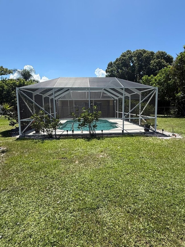 Building Photo - 3/2/1 POOL Home with Fenced Yard--Pool & Y...