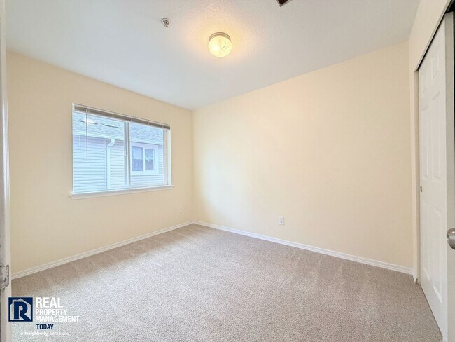 Building Photo - Spacious 4-Bedroom Townhome in Alicia Meadows | Garage, Patio & Pet Friendly