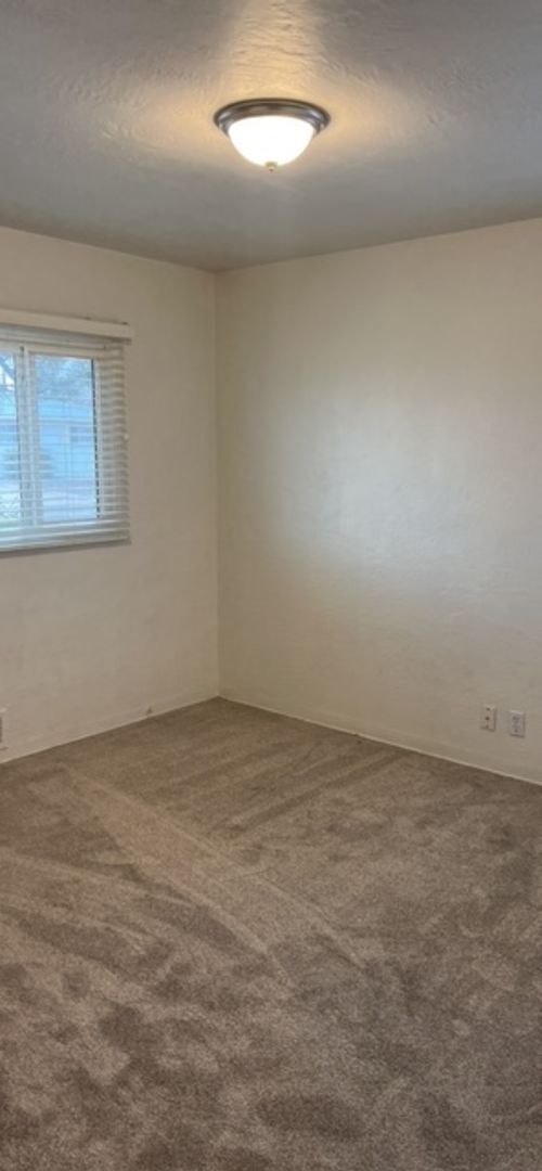 Building Photo - Nice 3 Bedroom 2 Bathroom, 2 Living areas. NE Heights, with plenty of room to roam inside and out