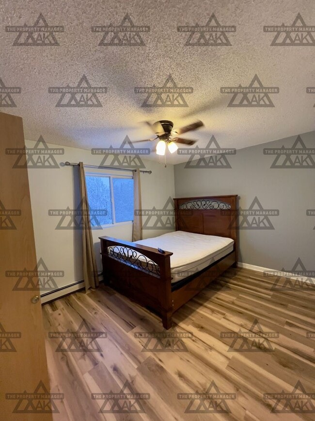 Building Photo - Charming Partially Furnished 2-Bedroom Condo for Rent