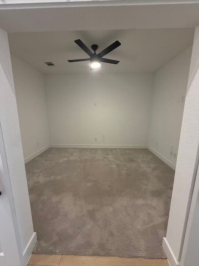 Building Photo - Move-in ready and like-new! Washer, dryer, and refrigerator Included.