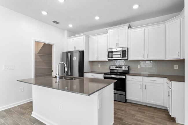 Building Photo - Modern Open-Concept Home with Designer Finishes and Community Amenities.