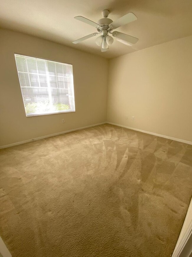 Building Photo - Spacious 2BR/2BA First-Floor Condo with Garage