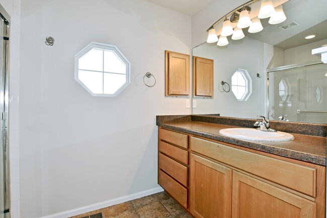 Large vanity and NEW lighting and toilet - 6349 Orchard Park Dr