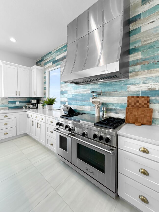 Building Photo - Waterfront Johns Pass Luxury | Steps to Beach + Pool, Hot Tub & Dock