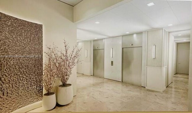 Building Photo - 19380 Collins Ave