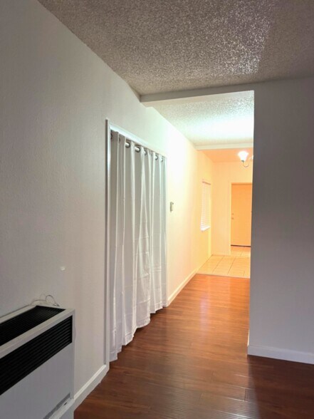 Hallway to kitchen, bathroom, & independent Bonus Room - 20826 Main St