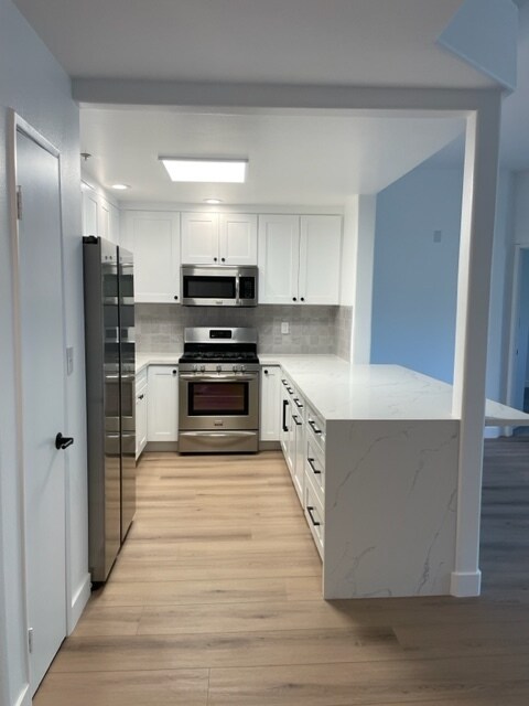 Building Photo - 4477 Woodman Ave