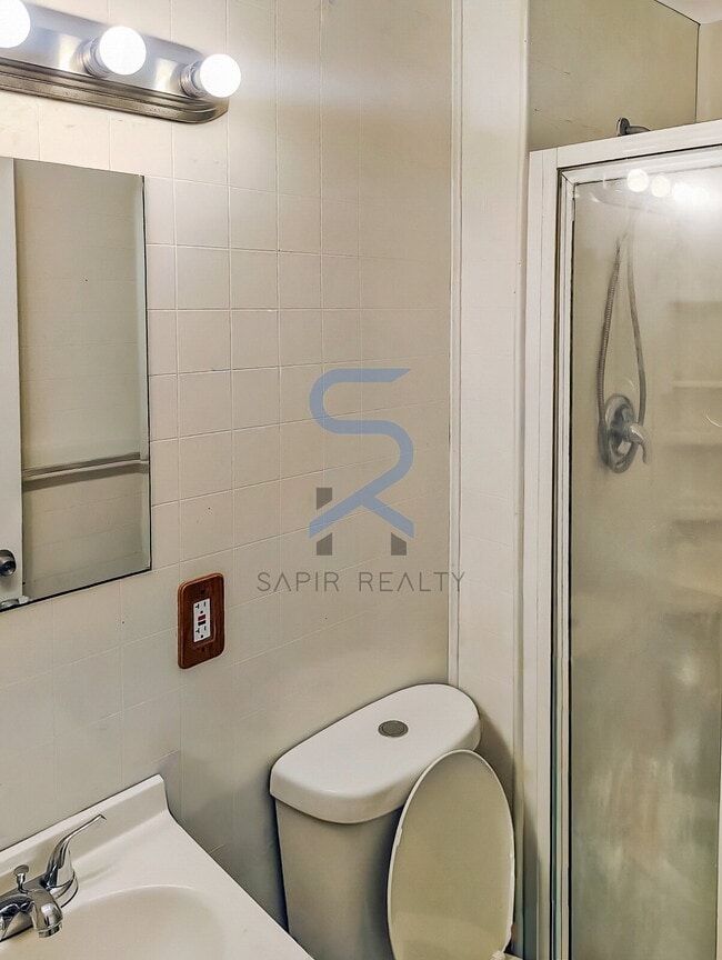 Building Photo - Move in before November 30th and choose your reward: a $250 Amazon Gift Card or a 55" Smart TV!