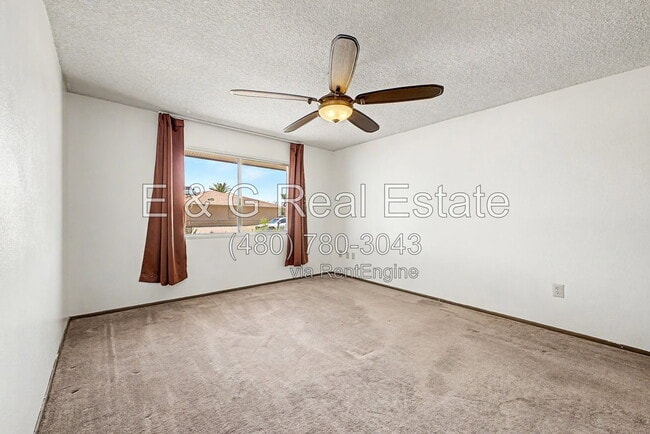 Building Photo - 9847 W Wrangler Dr