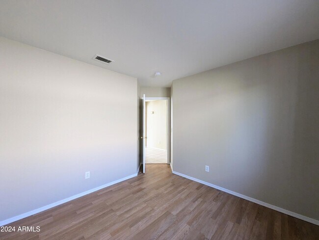 Building Photo - 7059 W Gardenia Ave