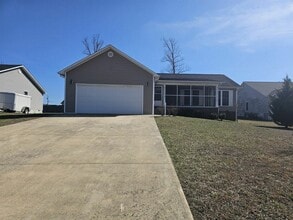 Building Photo - Spacious 3-Bedroom Home in Crossville with 2-Car Garage, Fenced Yard & Porches