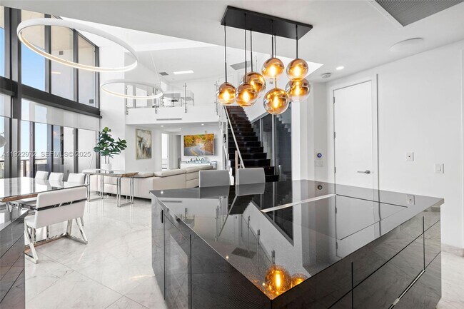 Building Photo - 18555 Collins Ave