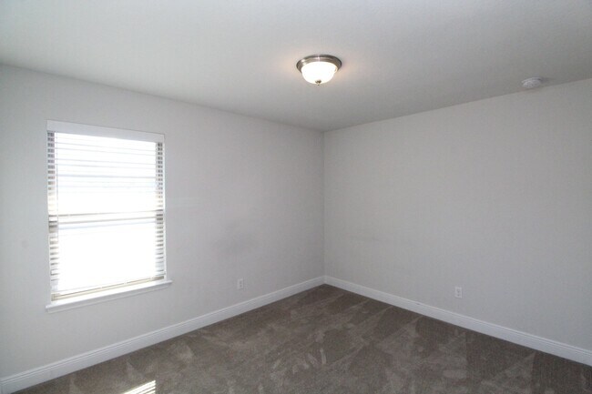 Building Photo - 4BR/2.5BA Home Near NAS Pensacola with First-Floor Primary, Stainless Kitchen & Covered Patio