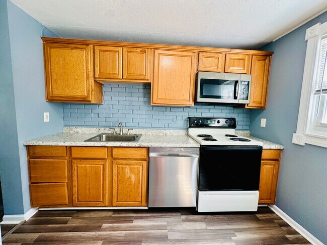 Building Photo - Updated 5BR/2BR house near Outer Loop now available!