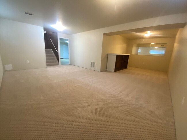 Building Photo - PRICE REDUCTION! A spacious three bedroom/...