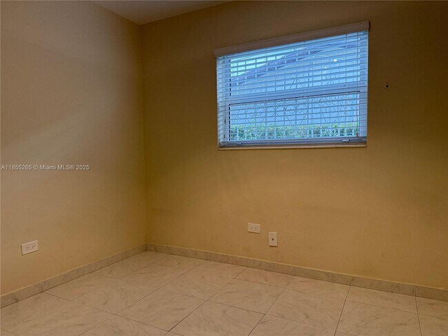 Building Photo - 1715 SW 102nd Ct