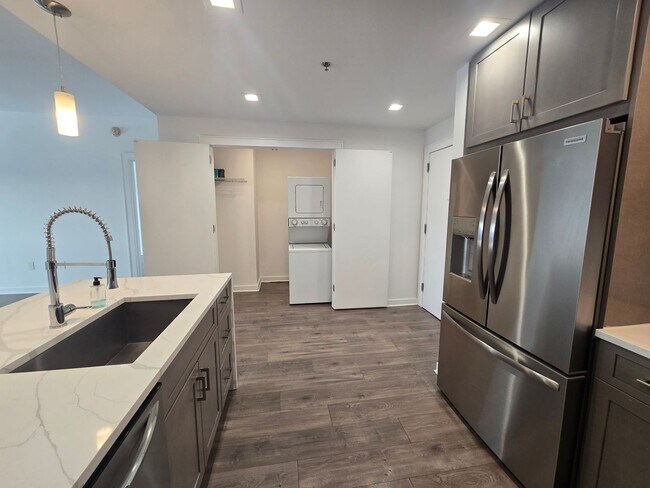 Building Photo - Be the first to occupy this renovated 2-bedroom & 2 full bathrooms condominium with lots of ameni...