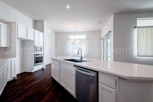 Building Photo - 4 Bedroom/3 Bath Home with Office and Paid Solar - $3395 Per Month!