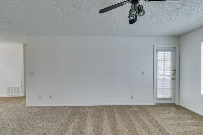 Building Photo - Charming Second-Floor Condo with Two Bedrooms and Fireplace