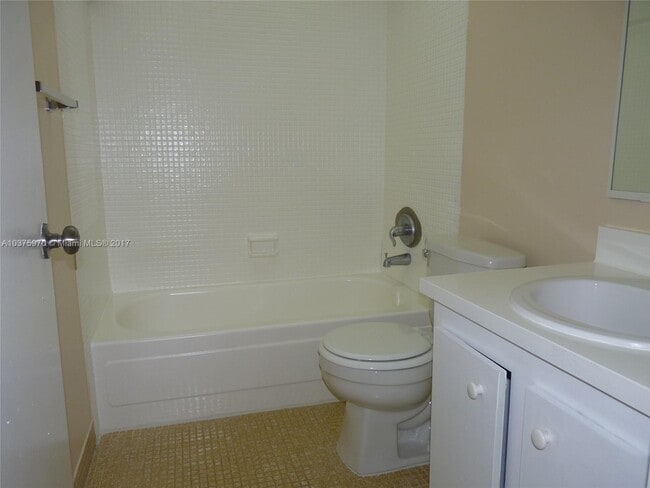 Building Photo - 3100 Coral Springs Dr