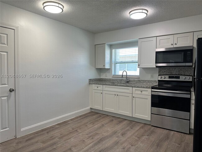 Building Photo - 2401 NW 9th Terrace