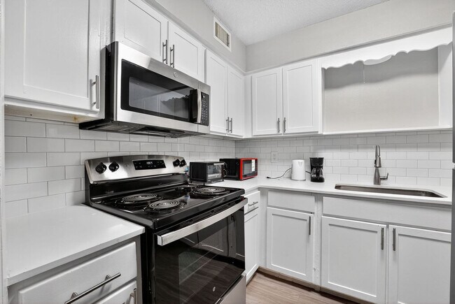 Building Photo - 9763 Audelia Rd